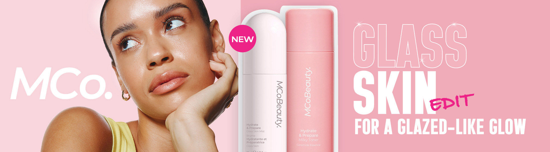 MCoBeauty logo. Woman looking up and right. New Glass skin edit for a glazed-lie glow.