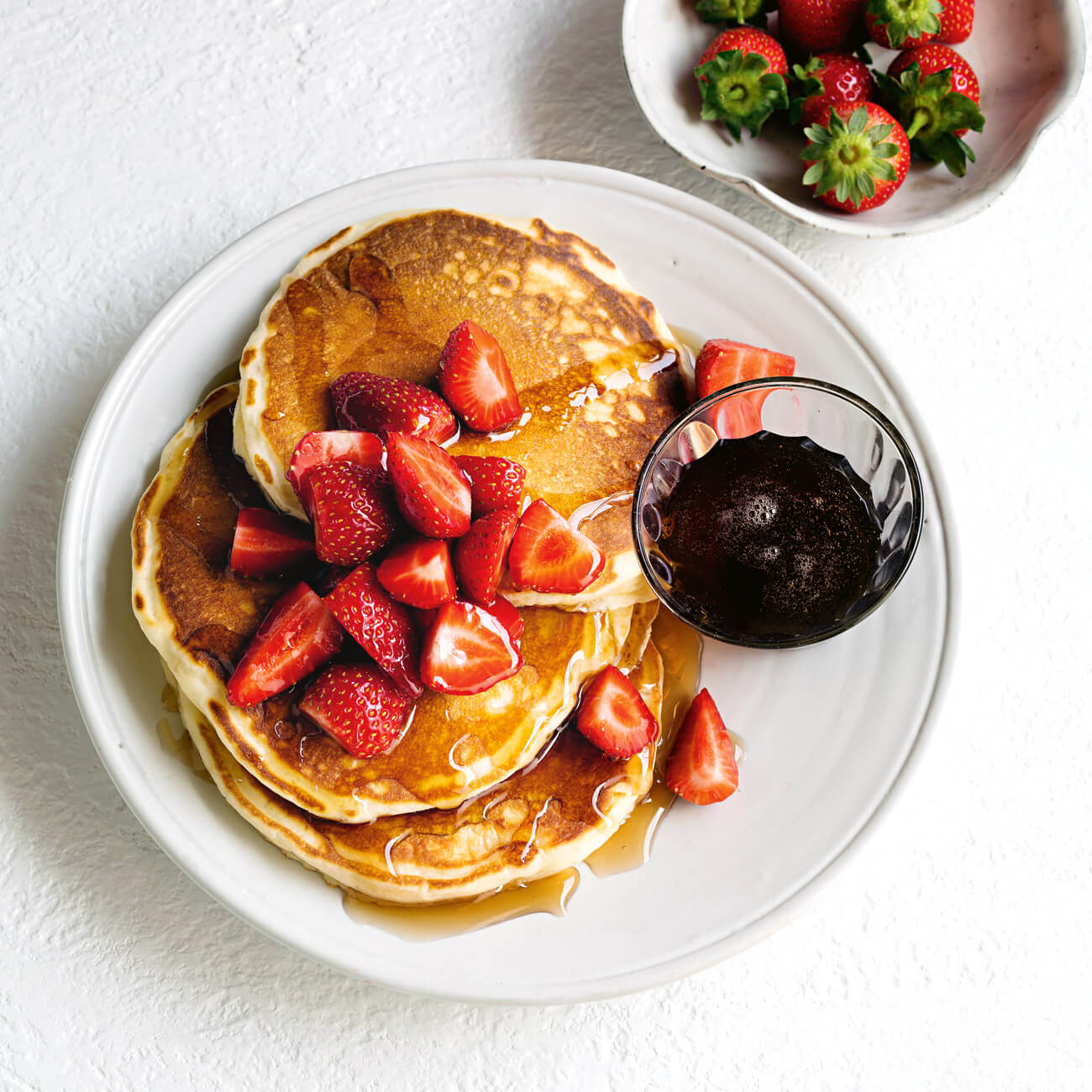 Basic Pancakes With Strawberries & Maple Syrup Recipe | Woolworths