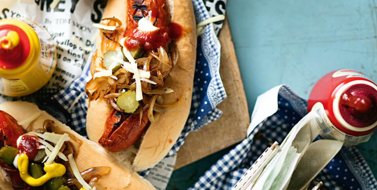 Kransky Dogs With Sauteed Onion And Swiss Cheese Recipe Woolworths